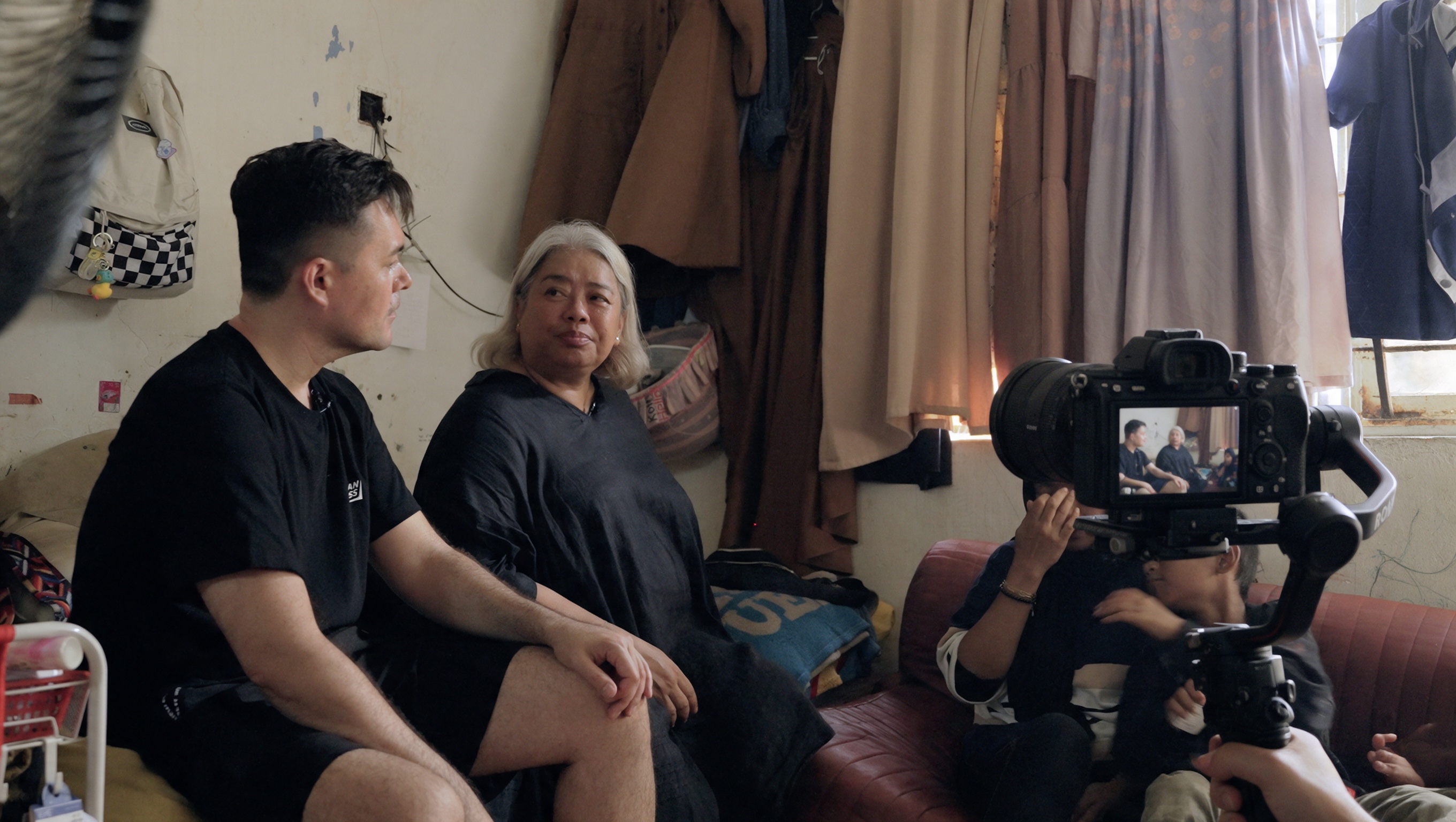 Kei and Dr. Hartini Zainudin filmed during a home visit in Kuala Lumpur